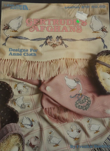 Volantino punto croce afghani